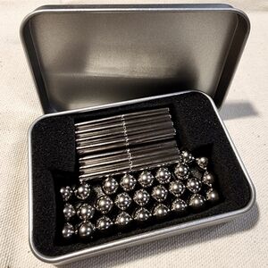 Magnetic rods with balls